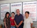The author at the Beijing branch of CRSA with three employees.