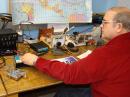 Judge Larry Wolfgang, WR1B, prepares to evaluate candidate radios at W1HQ. Left to right are the radios of KD1JV, WA2EUJ, N3ZI and NM0S.